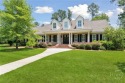 Step into timeless elegance in this beautifully crafted brick for sale in Pooler Georgia Chatham County County on GolfHomes.com