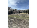 Sunny and level parcel near golf course with creek running for sale in Sun Valley Idaho Blaine County County on GolfHomes.com