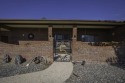 Step into this charming, expansive one-story brick home nestled for sale in Cody Wyoming Park County County on GolfHomes.com