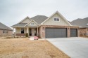 Beautiful Persimmon floor plan located on Pheasant Run Golf for sale in Enid Oklahoma Garfield County County on GolfHomes.com