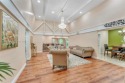 Welcome to your dream home! This stunning 3-bedroom, 2-bath for sale in Tamarac Florida Broward County County on GolfHomes.com