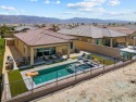 Welcome to your dream retreat at the 14th hole of the golf for sale in Indio California Riverside County County on GolfHomes.com