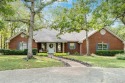This stunning ranch-style brick home is nestled on a spacious for sale in Star Harbor Texas Henderson County County on GolfHomes.com