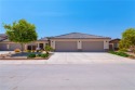 Welcome to this beautifully maintained 3-bedroom, 2-bath POOL for sale in Fort Mohave Arizona Mohave County County on GolfHomes.com