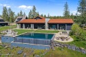 Estate 71 is nestled in the heart of Gozzer Ranch on a private for sale in Harrison Idaho Kootenai County County on GolfHomes.com