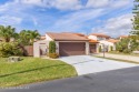 Exquisitely updated, one-story end-unit located in prestigious for sale in Melbourne Florida Brevard County County on GolfHomes.com