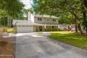 Discover the ultimate coastal lifestyle in this beautifully for sale in Pine Knoll Shores North Carolina Carteret County County on GolfHomes.com