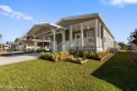 This is a gorgeous one! Built in 2023 the first owner to for sale in Barefoot Bay Florida Brevard County County on GolfHomes.com