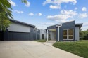 Stunning modern retreat atop a heavily treed .47-acre lot for sale in Dallas Texas Dallas County County on GolfHomes.com