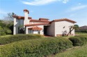 Welcome to your Mediterranean-Spanish dream home! This exquisite for sale in Rancho Viejo Texas Cameron County County on GolfHomes.com