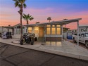 Enjoy comfortable, resort-style living in this fully furnished for sale in Bullhead City Arizona Mohave County County on GolfHomes.com
