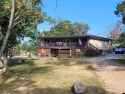 Nestled on two nice lots in the picturesque community of for sale in Horseshoe Bend Arkansas Izard County County on GolfHomes.com