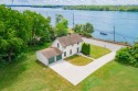 Offered is a historic farm house in the most desirable location for sale in Grosse Ile Michigan Wayne County County on GolfHomes.com