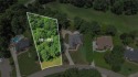Lovely .68-acre lot perfectly situated at the 11th tee of the for sale in Flowery Branch Georgia Hall County County on GolfHomes.com