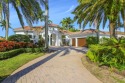 Nestled on nearly a half acre estate lot with picturesque sunset for sale in West Palm Beach Florida Palm Beach County County on GolfHomes.com