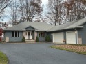 This spacious 4-bedroom, 2-bathroom home offers the best of both for sale in Houghton Lake Michigan Roscommon County County on GolfHomes.com