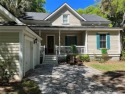THIS DELIGHTFUL COTTAGE WILL CONVEY BEAUTIFULLY FURNISEHED AND for sale in Daufuskie Island South Carolina Beaufort County County on GolfHomes.com