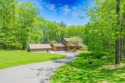 Looking for Country Charm with MODERN updates? This cedar clad for sale in Kunkletown Pennsylvania Monroe County County on GolfHomes.com