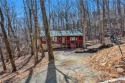 Charming Log Cabin in the Heart of Bent Tree Community.  Escape for sale in Jasper Georgia Pickens County County on GolfHomes.com