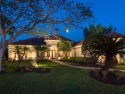 Spectacular estate home situated lakefront on almost half an for sale in Englewood Florida Sarasota County County on GolfHomes.com