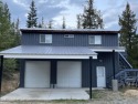 Shop/home built out on upper level in 2018/2022. Shop was for sale in Priest Lake Idaho Bonner County County on GolfHomes.com