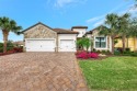 This home features the popular Summerville open concept floor for sale in Bradenton Florida Manatee County County on GolfHomes.com