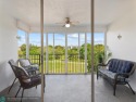 Step into this inviting, sunlit corner unit boasting three for sale in Pompano Beach Florida Broward County County on GolfHomes.com