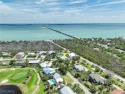 Discover modern coastal luxury at 982 Sand Castle Road, a fully for sale in Sanibel Florida Lee County County on GolfHomes.com