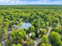 Escape. Earn. Enjoy. This end-unit townhome filled with modern for sale in Lake Harmony Pennsylvania Carbon County County on GolfHomes.com
