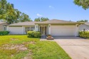This updated home offers one of the most stunning views in all for sale in Palm Harbor Florida Pinellas County County on GolfHomes.com