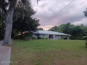 Stunning 4-bedroom 4 bath brick home with metal roof across from for sale in Palatka Florida Putnam County County on GolfHomes.com