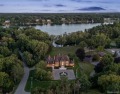 Set on over two acres along the coveted shores of all-sports for sale in Orchard Lake Michigan Oakland County County on GolfHomes.com