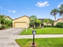 This stunning lakefront home in the highly desirable Elysium for sale in Royal Palm Beach Florida Palm Beach County County on GolfHomes.com