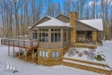 Located in the prestigious Garland Golf Resort, this exceptional for sale in Lewiston Michigan Oscoda County County on GolfHomes.com