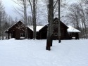 Amazing fully furnished log home on the 6th tee of Garland's for sale in Lewiston Michigan Oscoda County County on GolfHomes.com