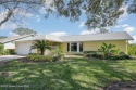 Located in a military, country club community, this charming for sale in Melbourne Florida Brevard County County on GolfHomes.com