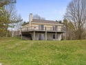 Nice 2 bedroom, 2 bath home that has seasonal views of Crystal for sale in Beulah Michigan Benzie County County on GolfHomes.com