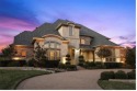 Perched on a breathtaking over half-acre lot along the rolling for sale in Lewisville Texas Denton County County on GolfHomes.com