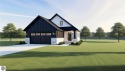 Walk out the door of your brand new custom home to the 18th hole for sale in Bellaire Michigan Antrim County County on GolfHomes.com