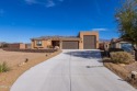 Discover this stunning, custom-built 4-bedroom home with an RV for sale in Lake Havasu City Arizona Mohave County County on GolfHomes.com