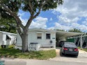 Beautiful 2/2 double wide on the Golf course - carport - shed - for sale in Davie Florida Broward County County on GolfHomes.com