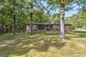 Nestled on a spacious corner lot in the heart of Fairfield Bay, Arkansas