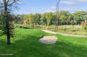 Enjoy peaceful golf course views from your balcony in this for sale in Manalapan New Jersey Monmouth County County on GolfHomes.com