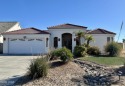 Located on the 4th fairway of the prestigious Huukan Golf Course for sale in Fort Mohave Arizona Mohave County County on GolfHomes.com