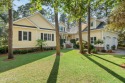 Discover the charming, well-maintained home in The Arboretum, a for sale in Caswell Beach North Carolina Brunswick County County on GolfHomes.com