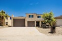 Excellent location and loaded with features! Across the street for sale in Lake Havasu City Arizona Mohave County County on GolfHomes.com