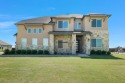 Welcome home! Here in the sought after Bridges Golf community for sale in Gunter Texas Grayson County County on GolfHomes.com