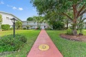 Nestled within the prestigious Century Village East, this rare for sale in Deerfield Beach Florida Broward County County on GolfHomes.com
