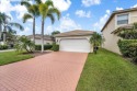 Welcome to your stunning dream home in the gated community of for sale in Royal Palm Beach Florida Palm Beach County County on GolfHomes.com