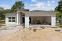 This brand new construction open floor concept plan boast a 12 for sale in Keystone Heights Florida Bradford County County on GolfHomes.com